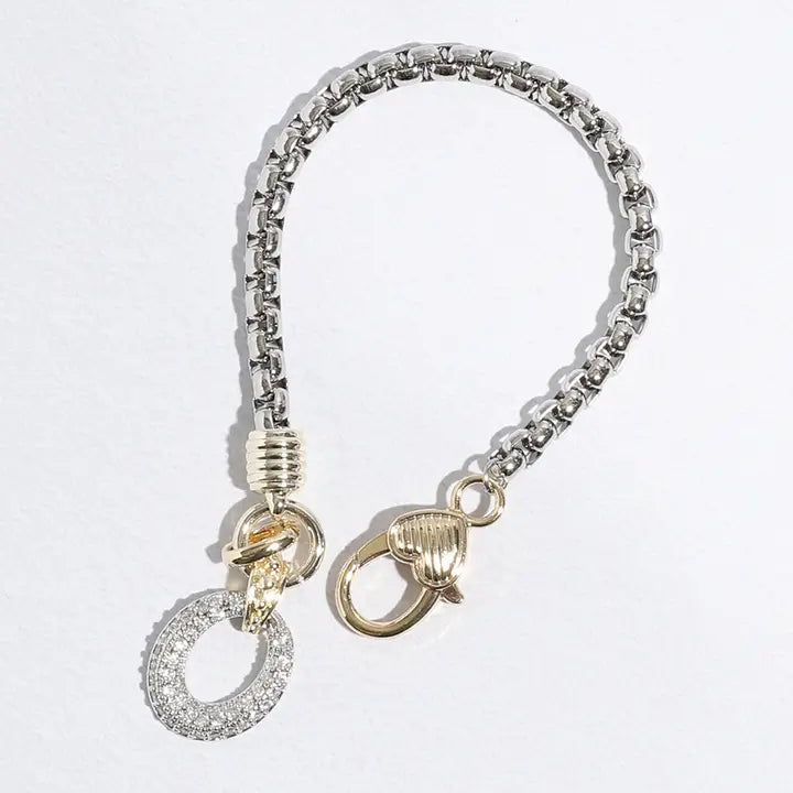 Two Tone Cz Stone Paved Open Oval Charm Bracelet